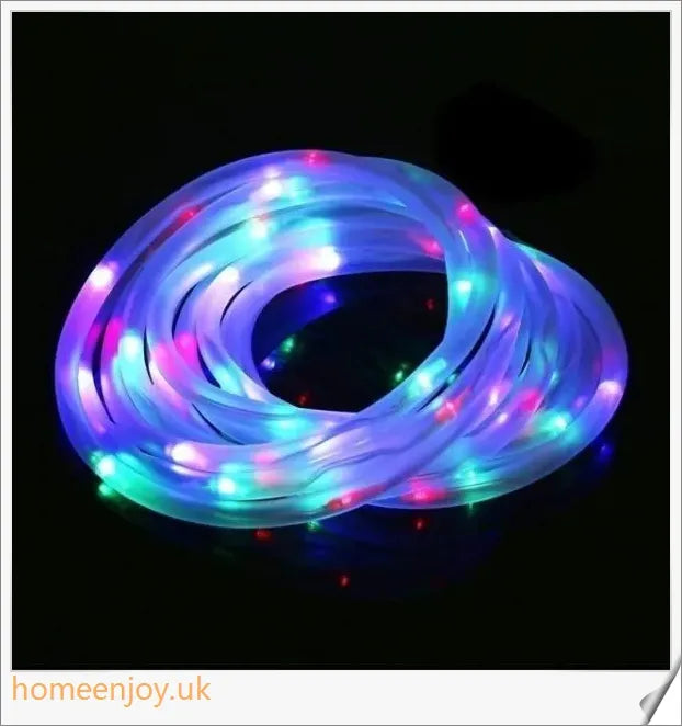 40ft solar-powered garden pathway light strips in use, illuminating a winding garden path with a warm, enchanting glow