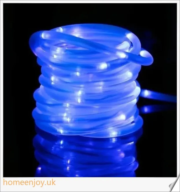 40ft solar-powered garden pathway light strips in use, illuminating a winding garden path with a warm, enchanting glow