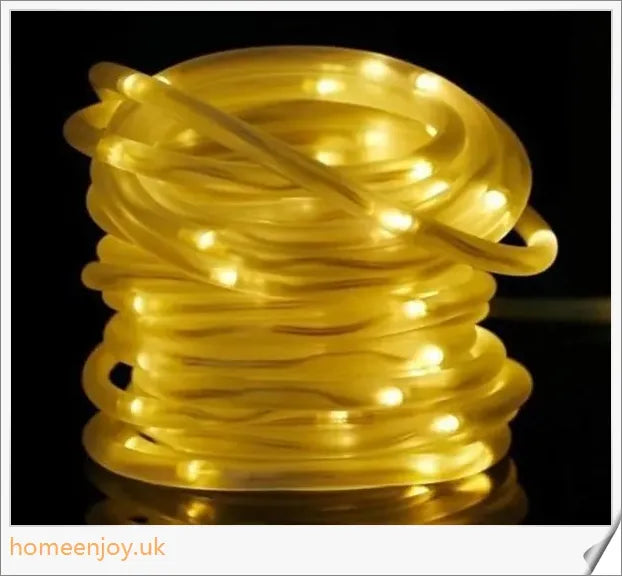 40ft solar-powered garden pathway light strips in use, illuminating a winding garden path with a warm, enchanting glow