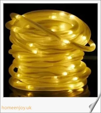 40ft solar-powered garden pathway light strips in use, illuminating a winding garden path with a warm, enchanting glow