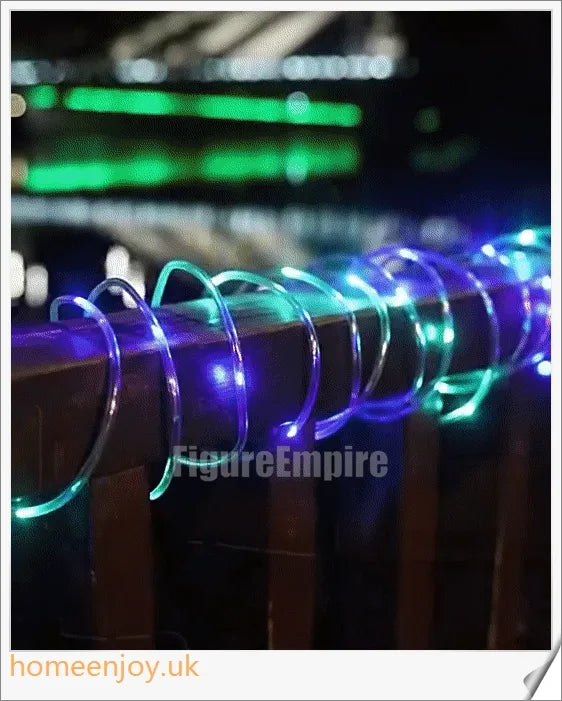 40ft solar-powered garden pathway light strips in use, illuminating a winding garden path with a warm, enchanting glow