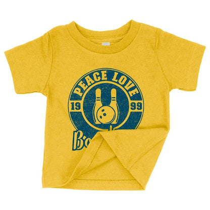 A soft, white baby t-shirt with a cute bowling-themed design, perfect for infants and toddlers.