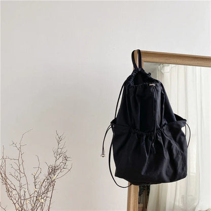 Creative drawstring bucket bag in white, black, brown, and zebra print patterns - a stylish and versatile women's tote bag made of high-quality polyester material
