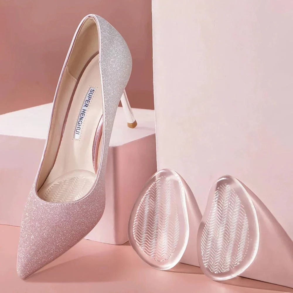 A pair of high heel shoes with transparent silicone insoles inside, providing cushioning and support for the wearer's feet.