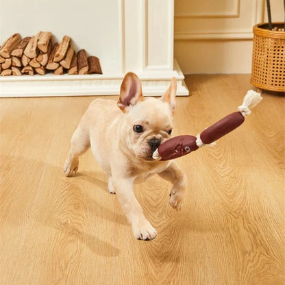 Durable cotton rope and vinyl sausage chew toy for dogs, designed to entertain and promote dental hygiene.