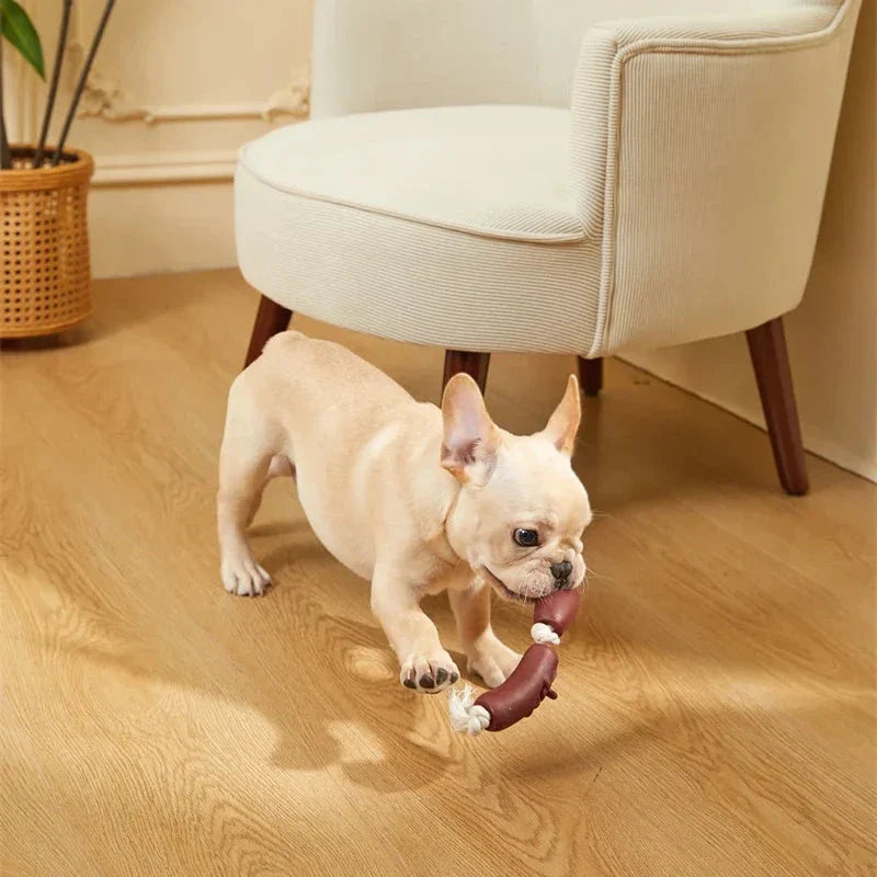 Durable cotton rope and vinyl sausage chew toy for dogs, designed to entertain and promote dental hygiene.