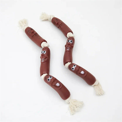 Durable cotton rope and vinyl sausage chew toy for dogs, designed to entertain and promote dental hygiene.