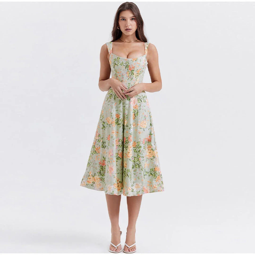 Chic printed spaghetti strap midi dress in green, a sophisticated and alluring design for the modern British woman