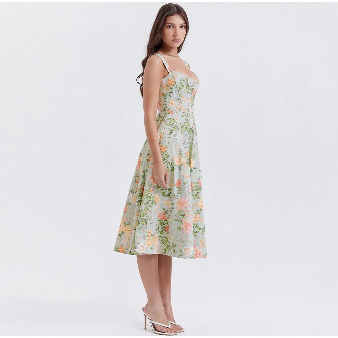 Chic printed spaghetti strap midi dress in green, a sophisticated and alluring design for the modern British woman