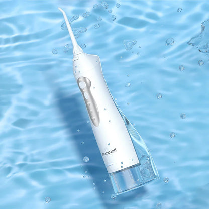 A stylish, rechargeable water flosser with four interchangeable nozzles for a personalised and thorough dental cleaning experience.