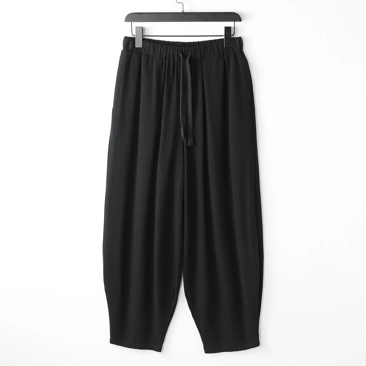 Loose linen harem pants with ankle ties in neutral colours for plus sizes