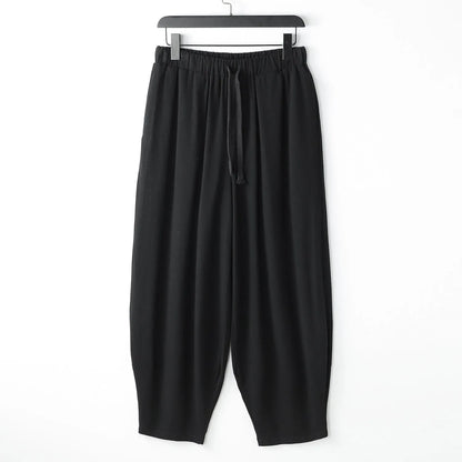 Loose linen harem pants with ankle ties in neutral colours for plus sizes