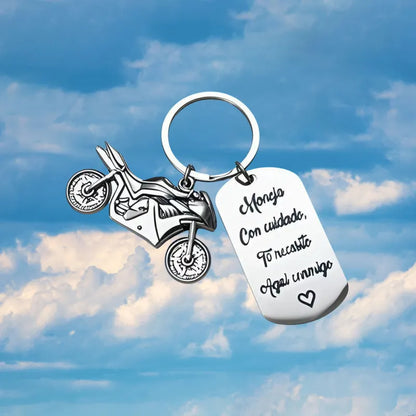 Stainless steel motorcycle-themed keychain with modern design and protective flannel bag