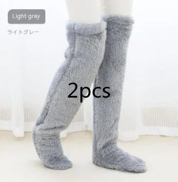 Cozy over-the-knee fuzzy socks in a variety of colors for winter warmth and comfort