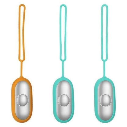 Hand-held micro-current sleep aid device in grey, green, or orange with round button and USB charging port