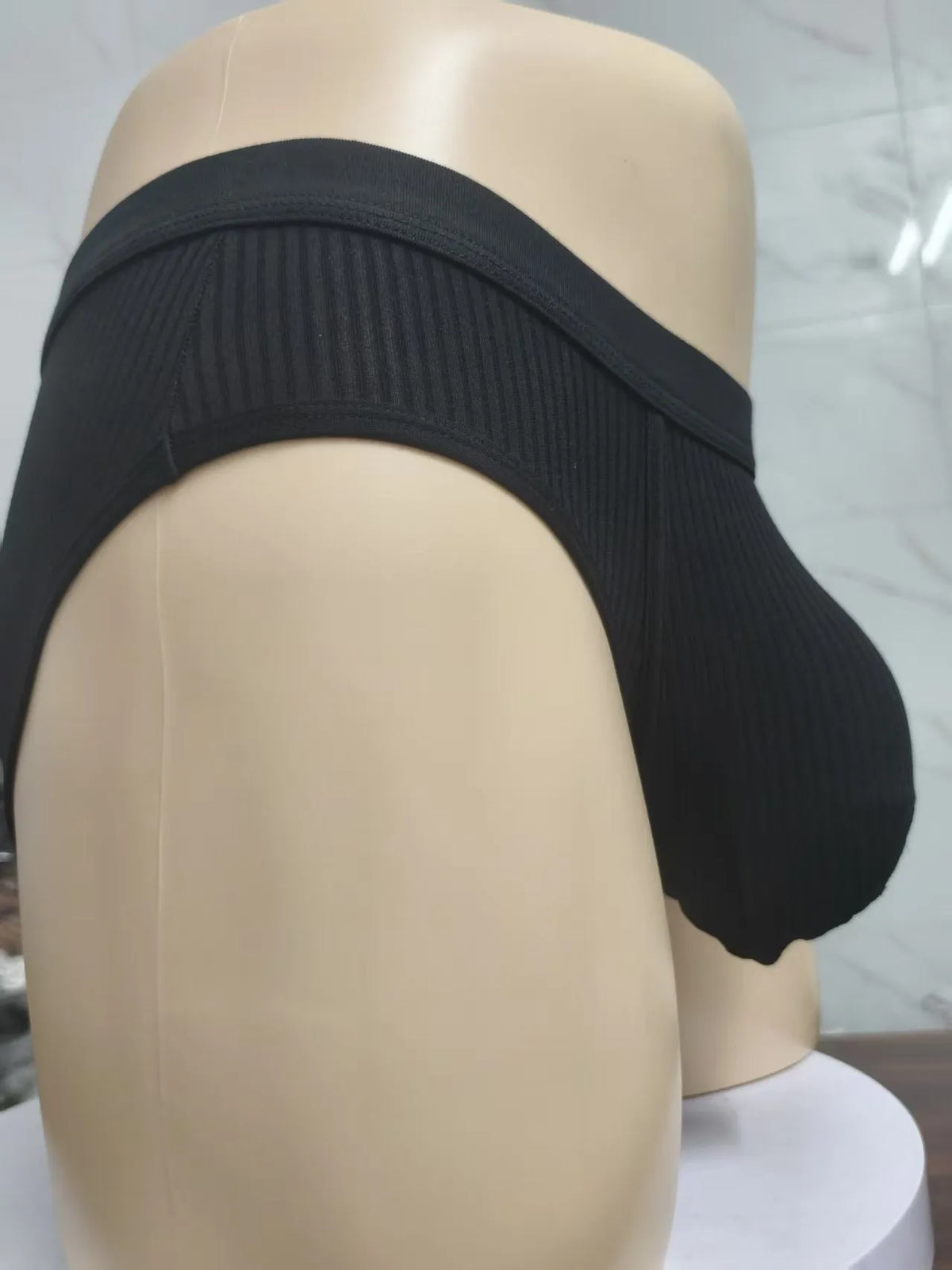 Men's triangle U-shaped bag underwear in viscose fabric showing solid colour options