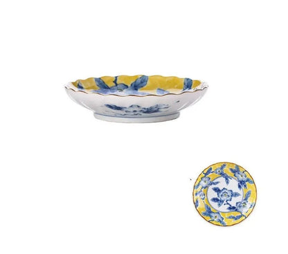 Yellow ceramic tableware set with colourful floral patterns, includes bowls and plates in Japanese style