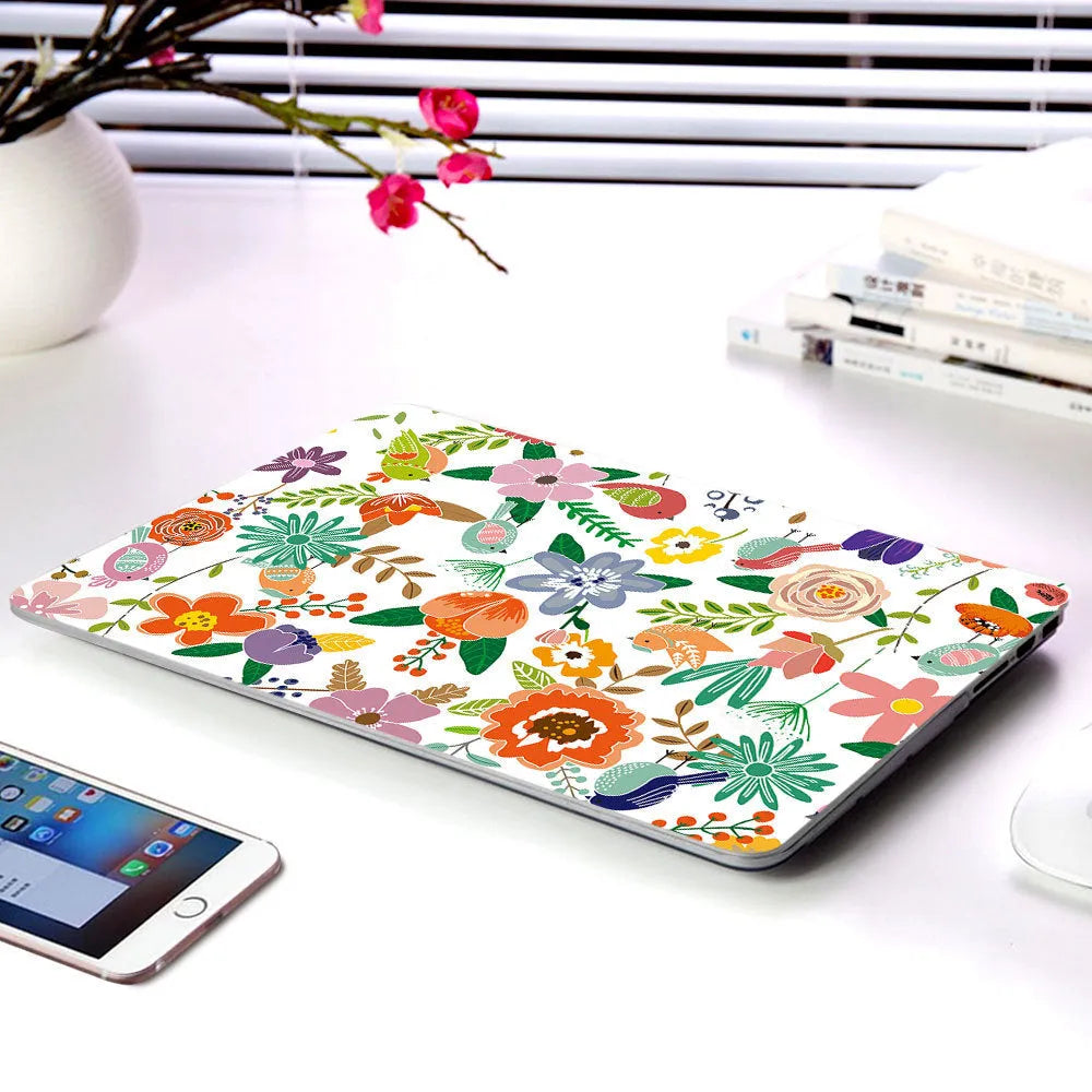 Plastic laptop protective shell with floral pattern for MacBook Air 11 inch and MacBook Pro 12 inch retina.