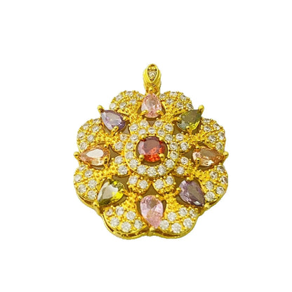 Close-up of a women's flower-shaped pendant necklace with a colourful zircon stone in a choice of gold, champagne gold, or platinum colour finishes.