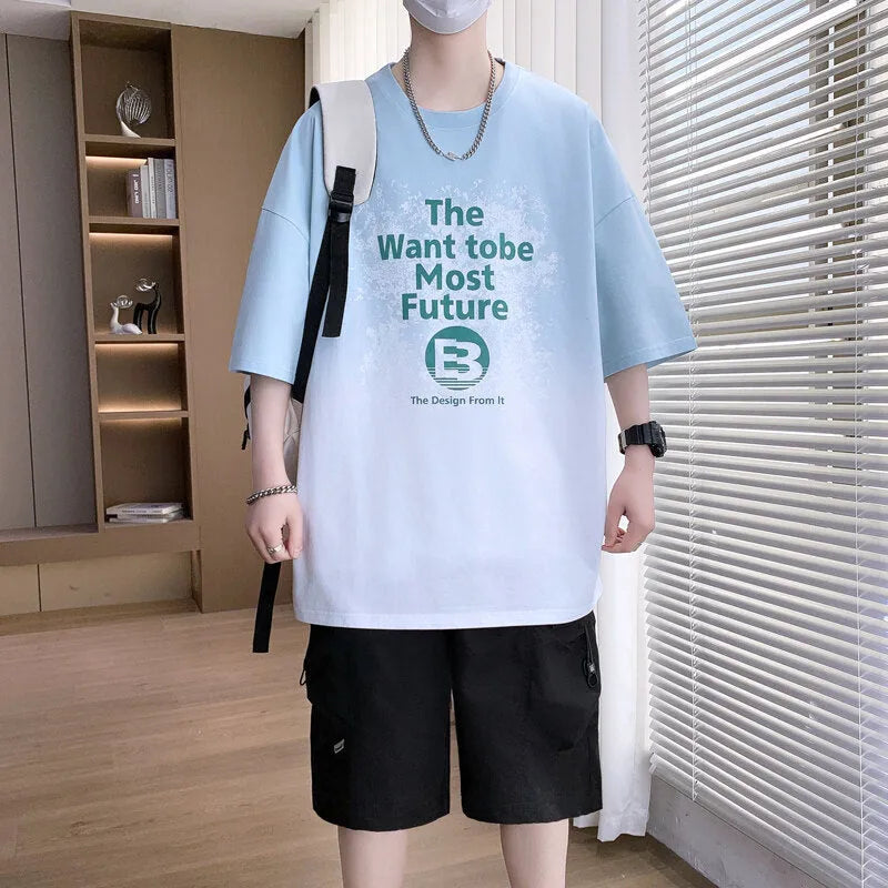 Boys cotton-polyester t-shirt with jacquard printed pattern in dark blue, short sleeves, drop-shoulder design