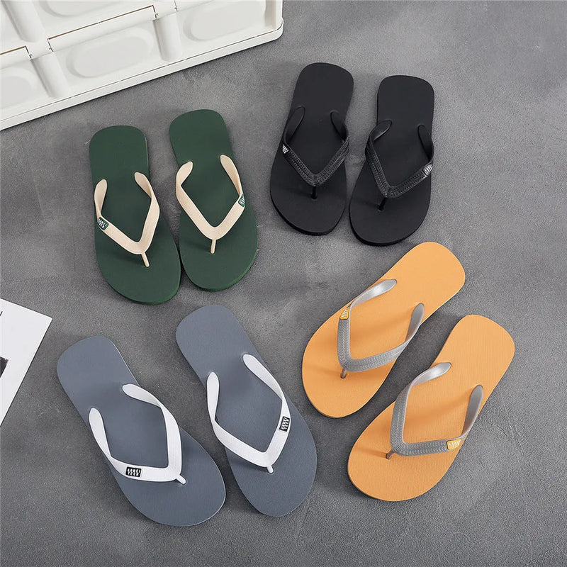 Men's flip-flop slippers with EVA upper and rubber sole in black, green, orange, or grey in sizes 39 to 44, featuring vulcanised construction for casual beach or home use
