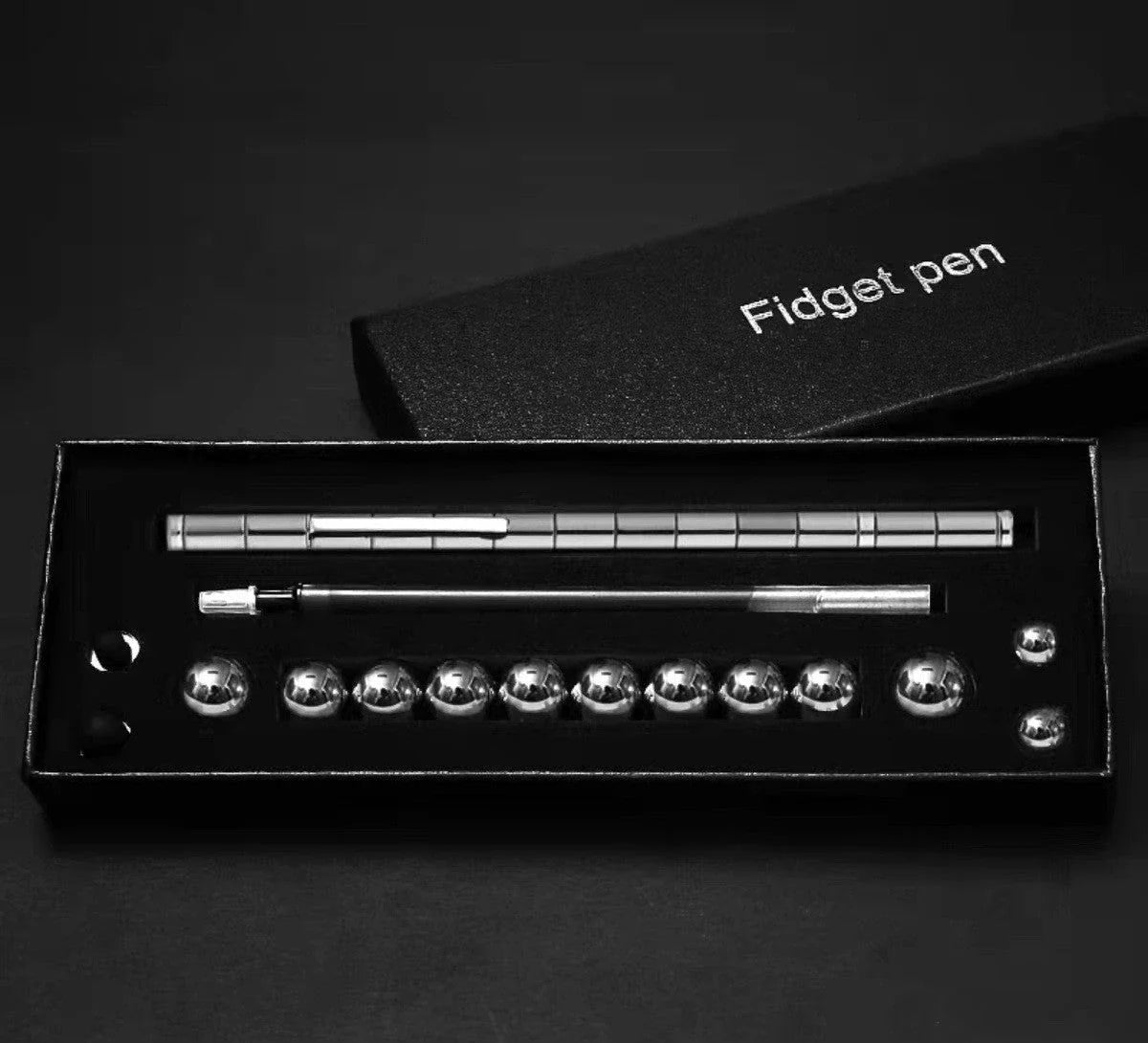 Modular magnetic pen with erasable ink, stress-relieving fidget features, and interchangeable components