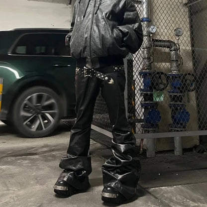 Black shiny patent leather coated skinny jeans with straight leg and mid waist