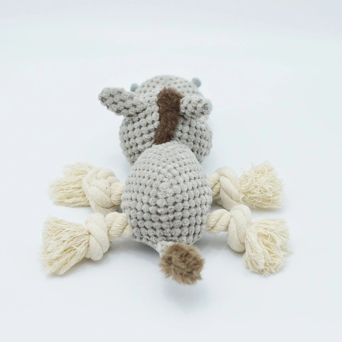 Grey donkey-shaped plush dog toy with cloth velvet material showing creaking sound feature