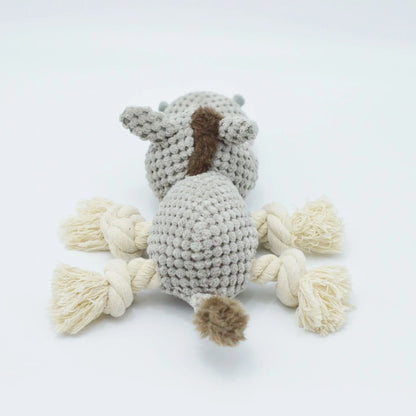 Grey donkey-shaped plush dog toy with cloth velvet material showing creaking sound feature