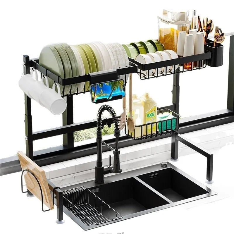 Black metal retractable sink draining rack extended on kitchen countertop