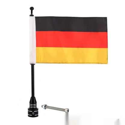 Motorcycle tail box flagpole for mounting on luggage carrier, in black or silver finish.