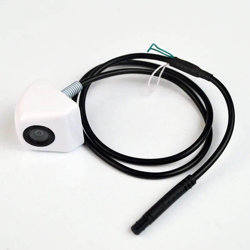 Black metal car reversing camera with lens and integrated wiring cable
