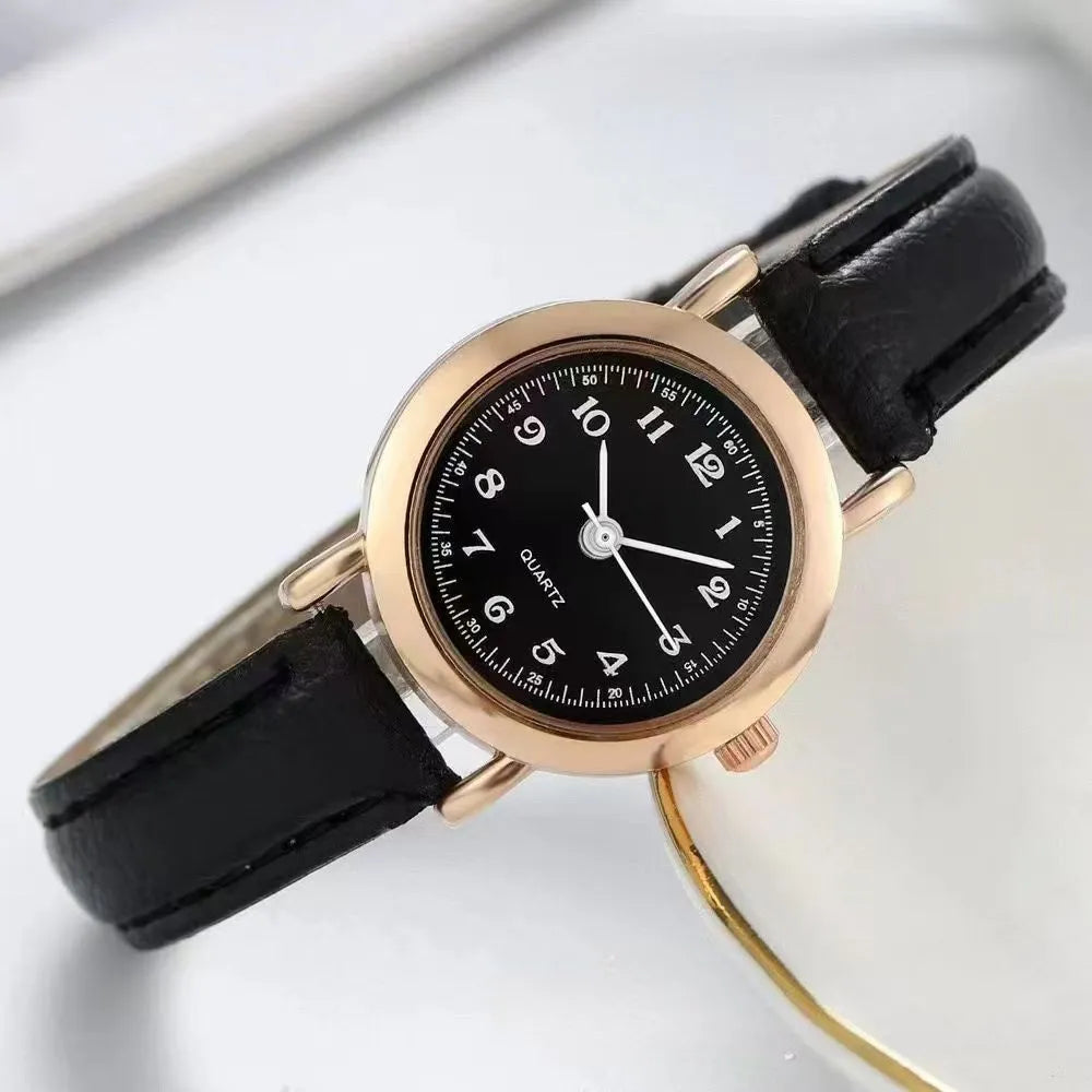 Retro round watch with 26mm dial, 8mm alloy case, and imitation leather strap with pin buckle