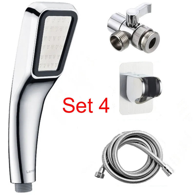 Orange hand-held pressurised shower head with rain function and attachment pieces