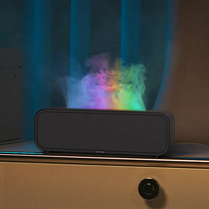 Black and white USB aroma diffuser with remote control showing flame dynamic and colour-changing light effects.