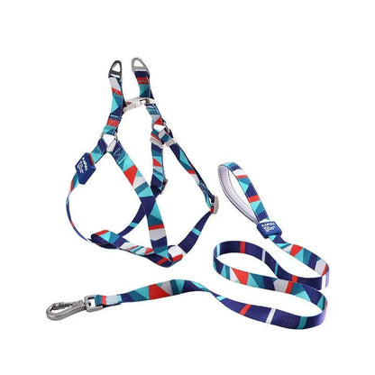 Blue polyester dog haulage vest with integrated leash set on a model, showing the chest strap and traction rope.