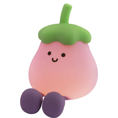 Cartoon eggplant-shaped night light with soft yellow glow measuring 100mm diameter