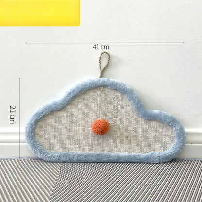 White natural sisal cat scratching mat with sleeping cat cartoon design, mounted on a wall.