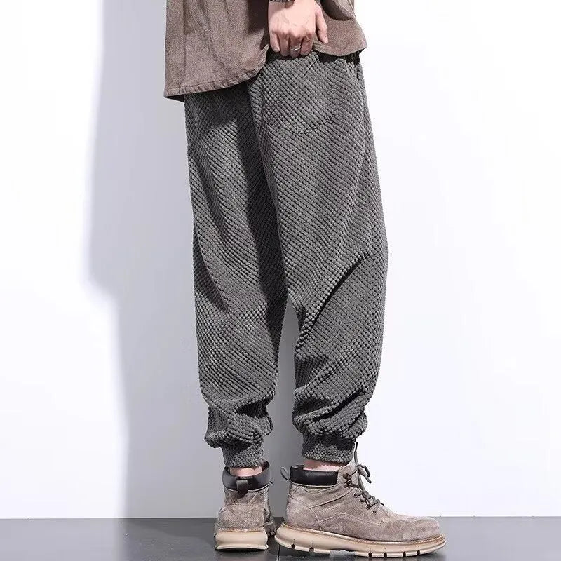 Men's grey ankle-tied sweatpants with straight leg cut and non-ironing fabric