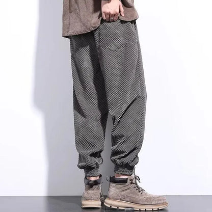 Men's grey ankle-tied sweatpants with straight leg cut and non-ironing fabric