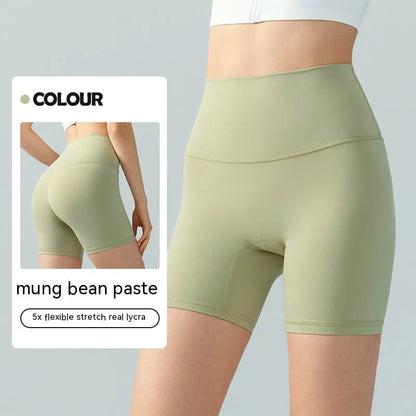 Women's high-waist Lycra yoga shorts in leaf green for yoga and fitness
