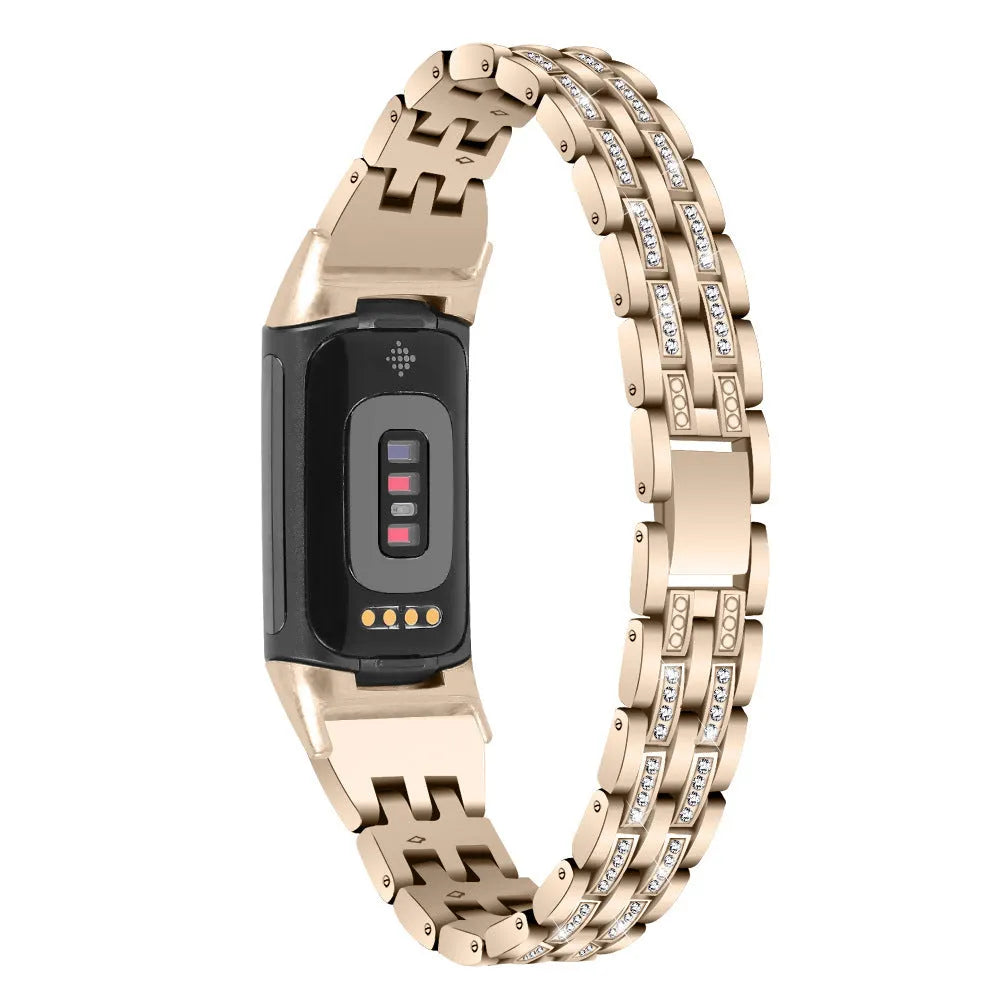 Diamond-patterned metal watch strap for Fitbit Charge 5 in rose gold colour.
