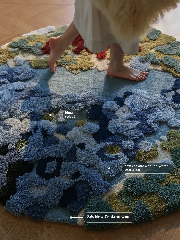 Ocean Secret Realm handmade round acrylic fibre carpet on a wooden floor.