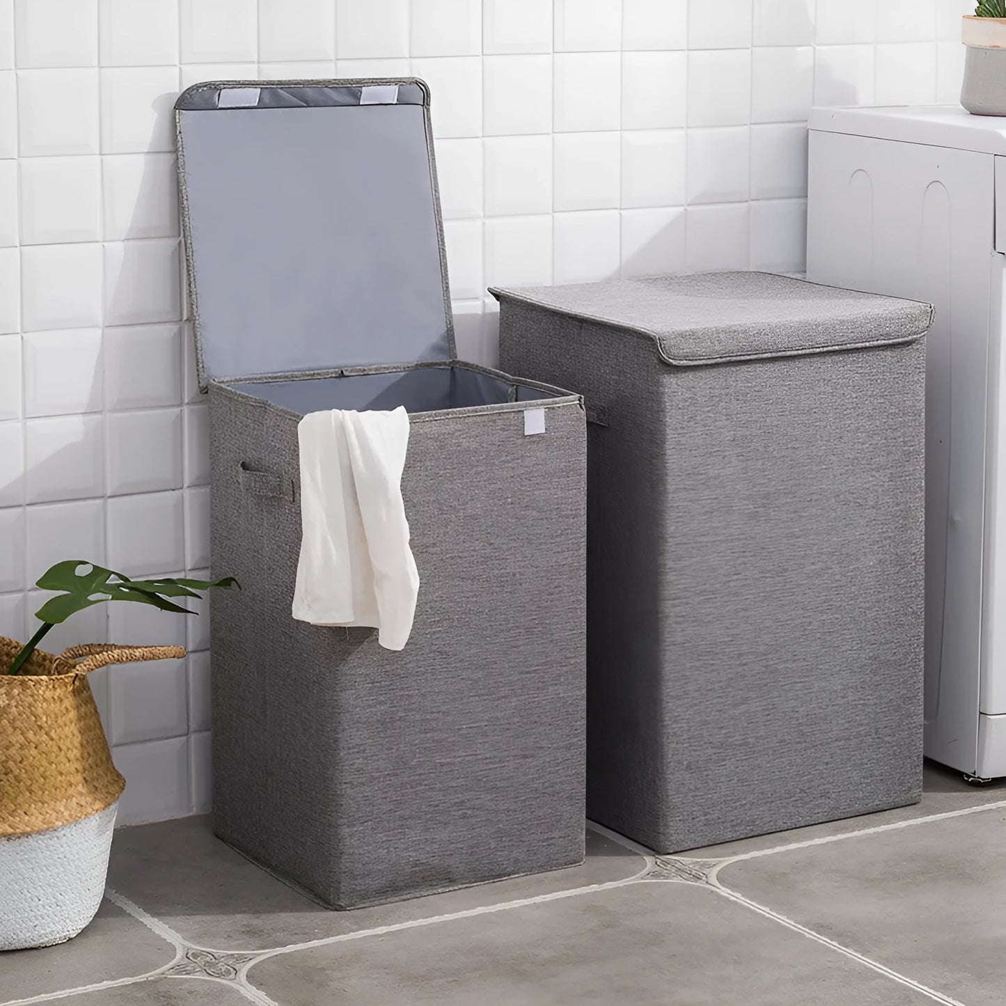 Foldable cube-shaped laundry basket in cotton linen fabric, shown in brown colour.