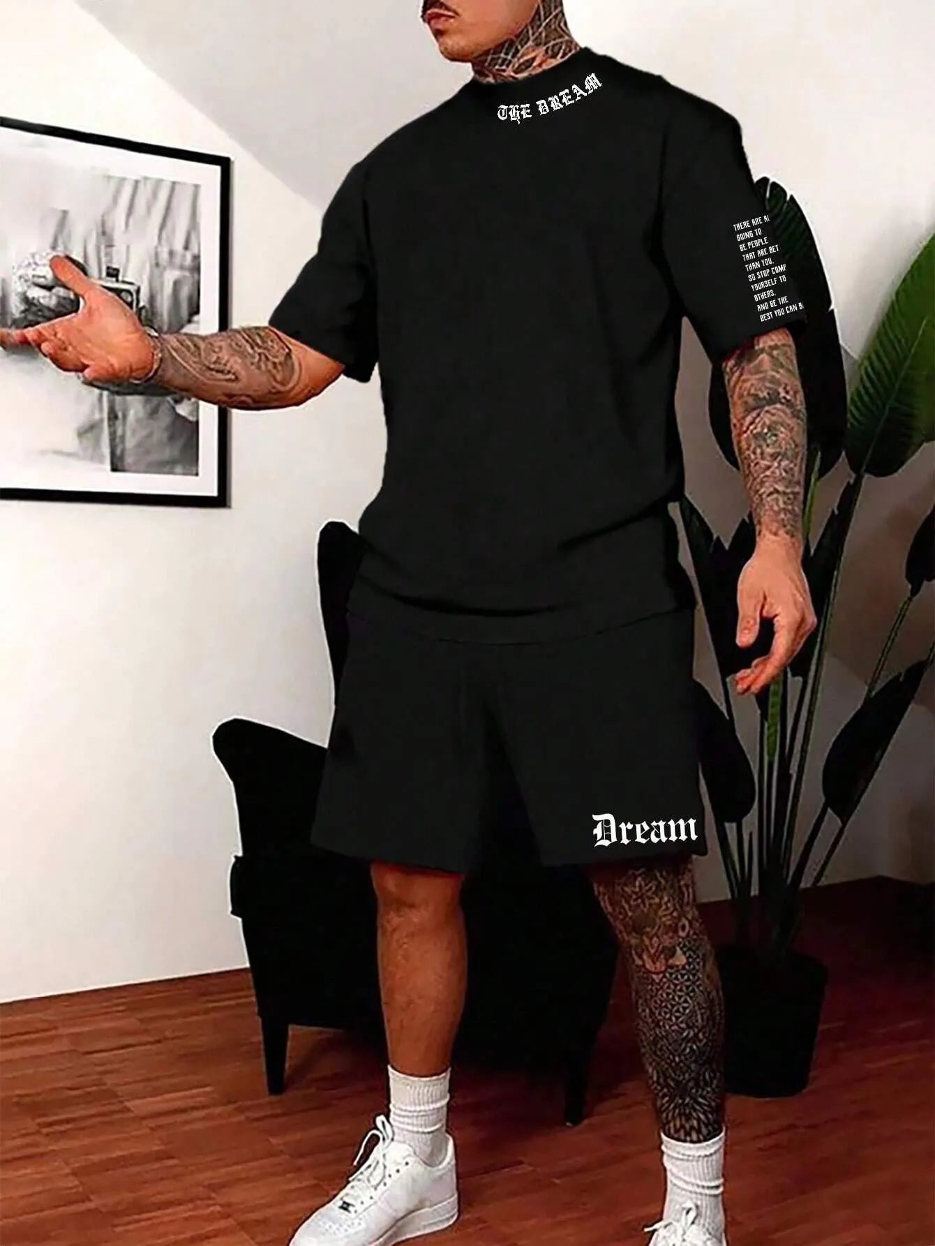 Man wearing a printed short-sleeve sports top and matching shorts in a quick-dry polyester blend.