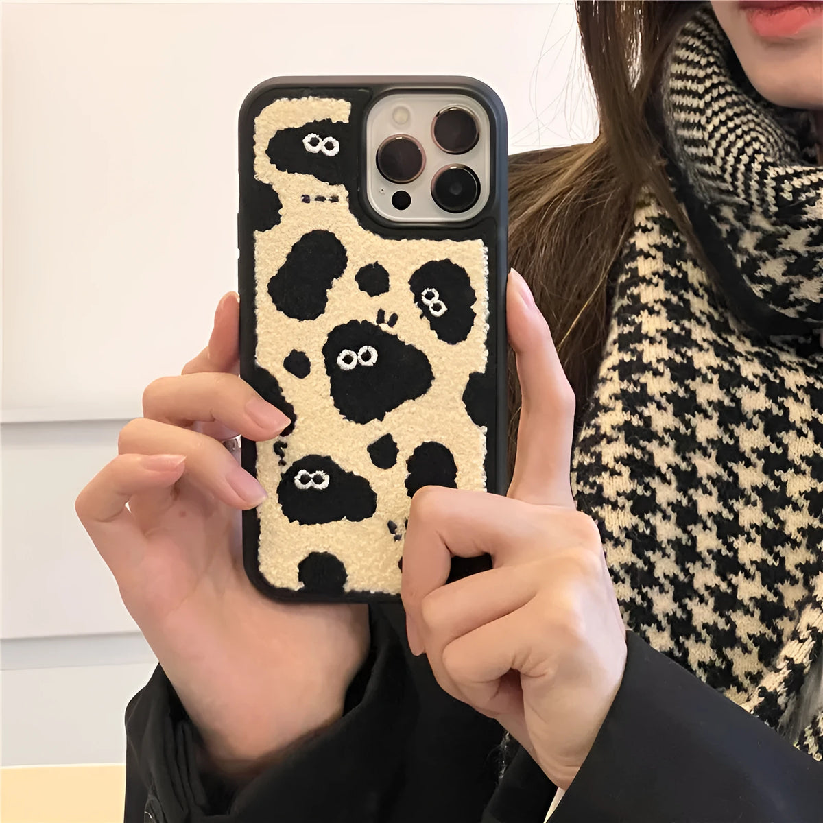 Black plush fairy design phone back cover for iPhone models including 13 Pro Max and 12 Pro.