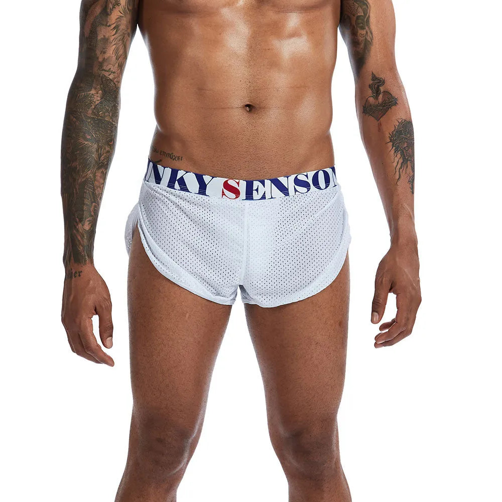 Men's solid colour breathable mesh boxer briefs on a mid waist, showing the fabric texture.