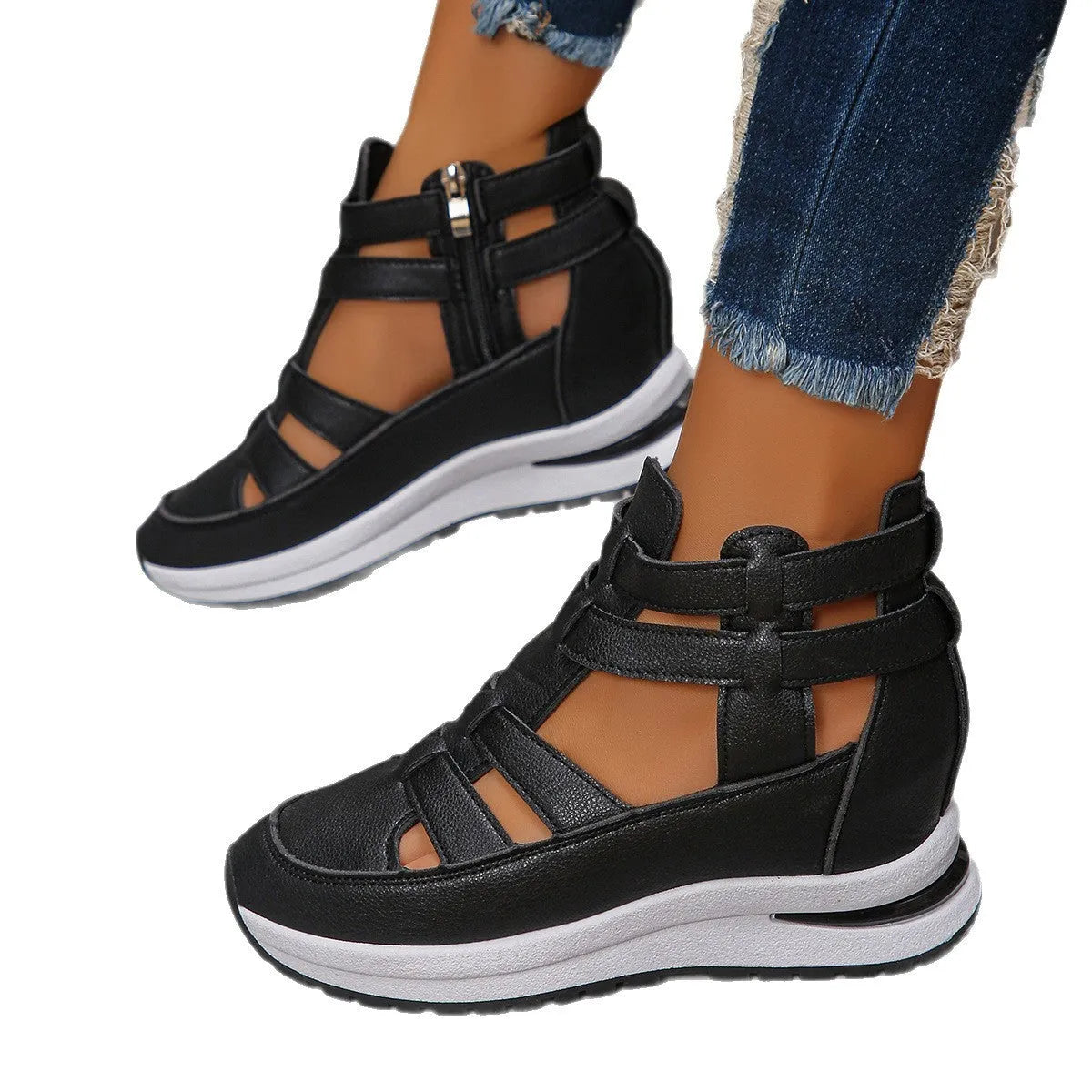 Black women's close-toed platform sandals with hollow-out design and Velcro strap.