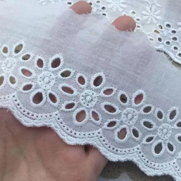 Cotton embroidered lace trim ribbon showing floral cutout patterns in four different width styles