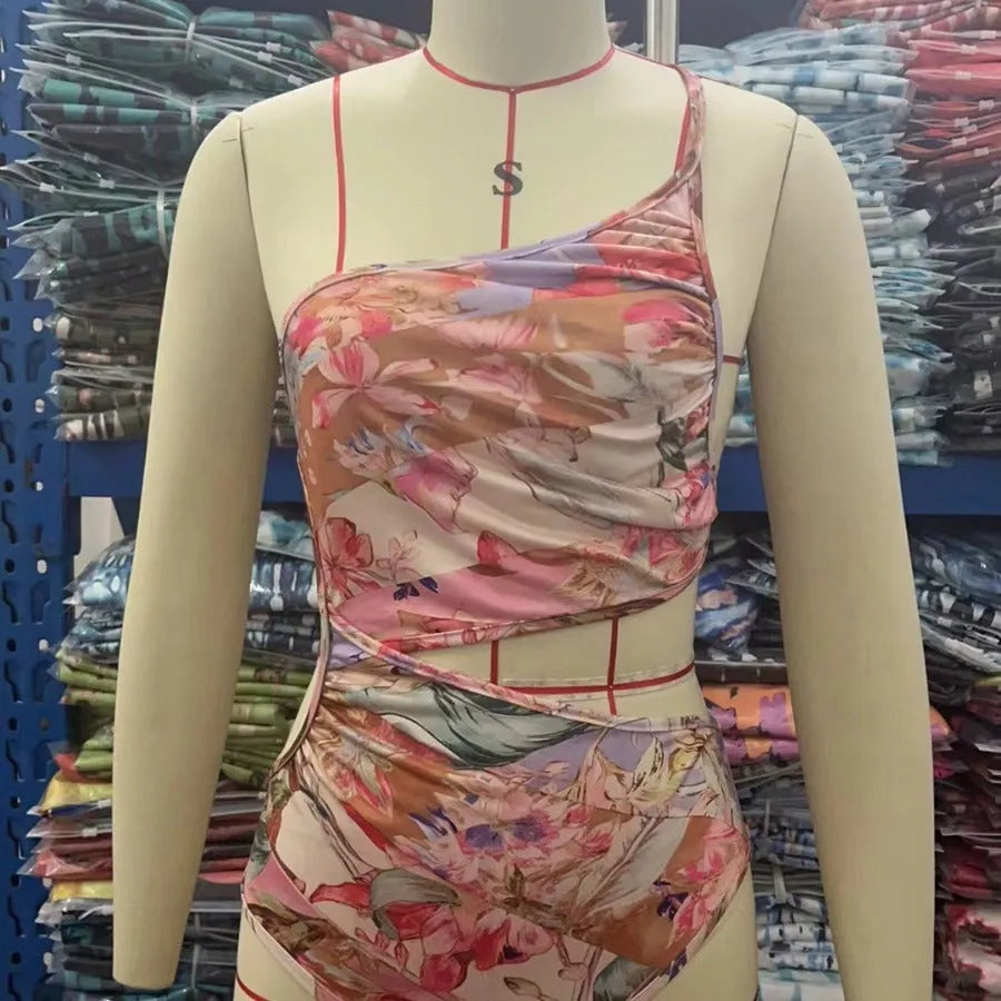 Rose gold patterned women's swimsuit on a white background